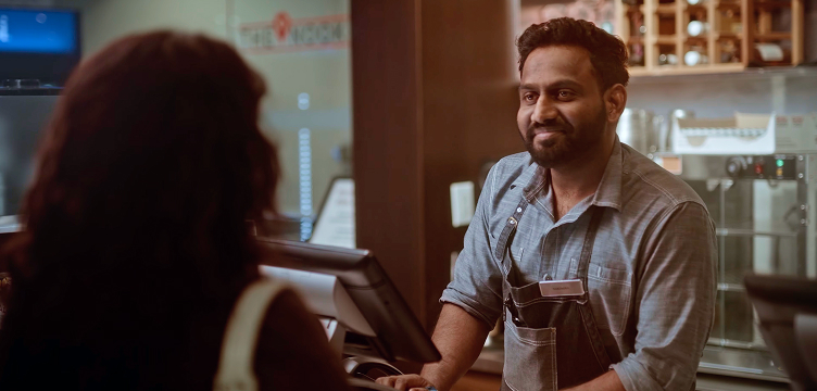 Decorative abstract image of two silhouetted people on a blue background.